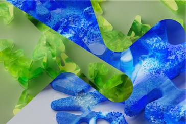 Bildet viser en abstrakt collage satt sammen av Forskningsrådets visuelle profil