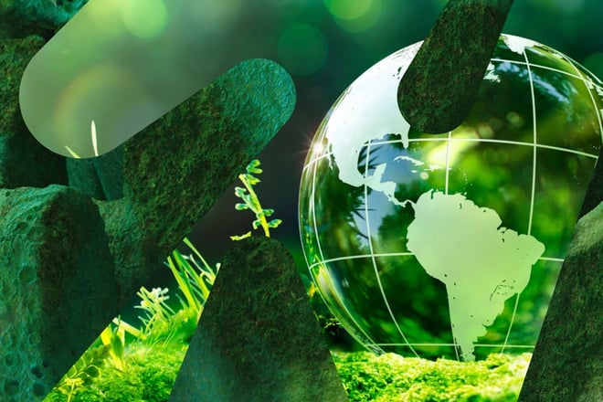 Glass jordklode mot grønn bakgrunn